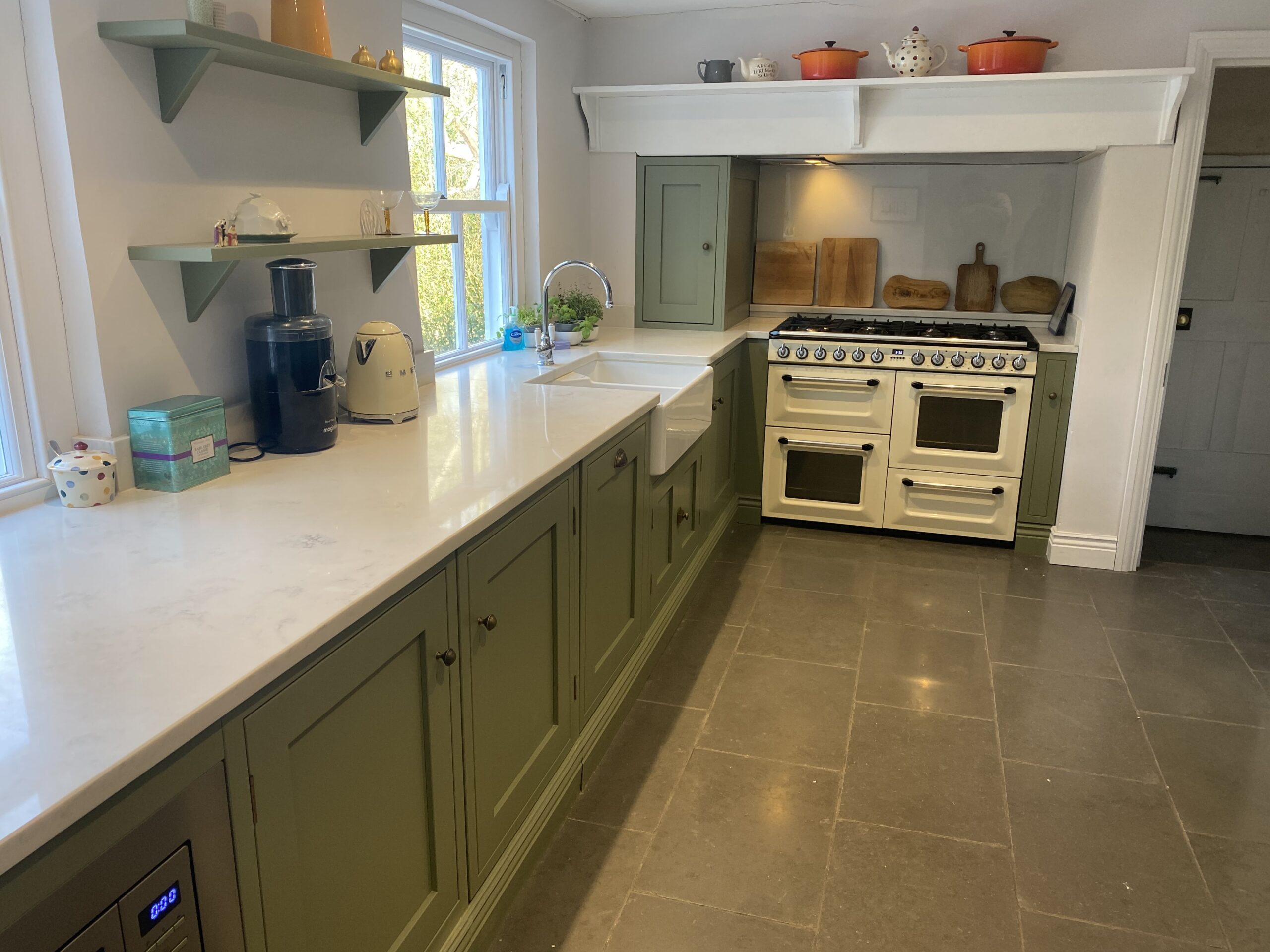 Bespoke hand-painted shaker kitchen by Regent St James featuring solid oak drawers and custom cabinetry