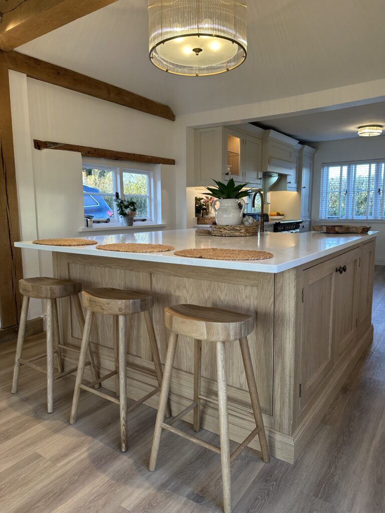 Handmade kitchen in Essex with built-in storage and modern appliances