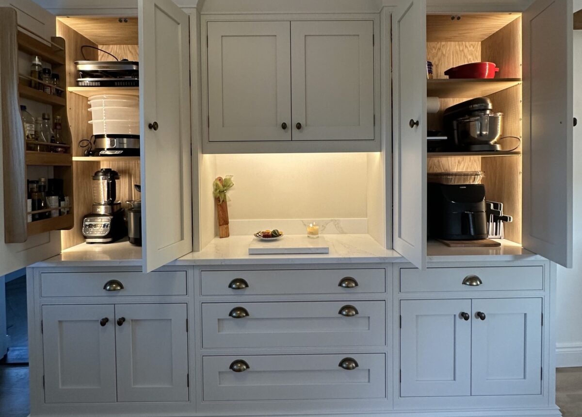 Elegant handmade kitchen in Essex with custom cabinets and lighting