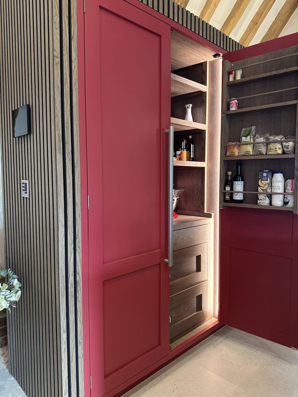 Handmade kitchen in Thaxted designed around bold Farrow & Ball colours and tactile finishes.