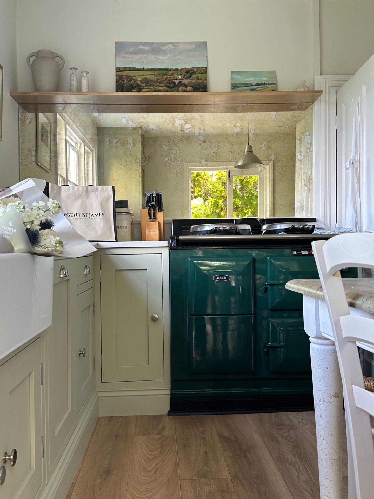 Bespoke kitchens finance with classic shaker cabinets and green Aga cooker.
