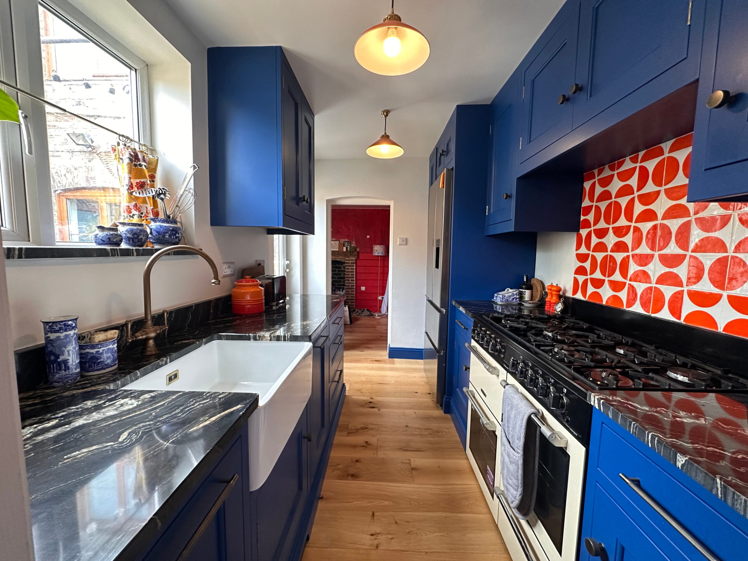 Long Melford handmade kitchen case study from Regent St James Kitchens showcasing bespoke design, hand-painted cabinetry and clever storage.