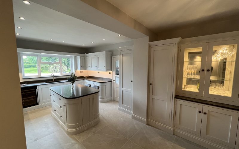 Bespoke kitchen in Sible Hedingham featuring curved island and light-filled open-plan layout