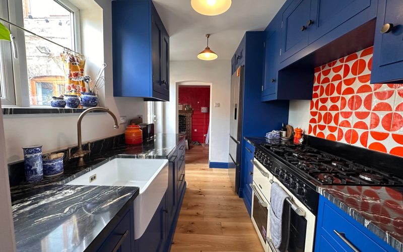 Long Melford handmade kitchen case study from Regent St James Kitchens showcasing bespoke design, hand-painted cabinetry and clever storage.