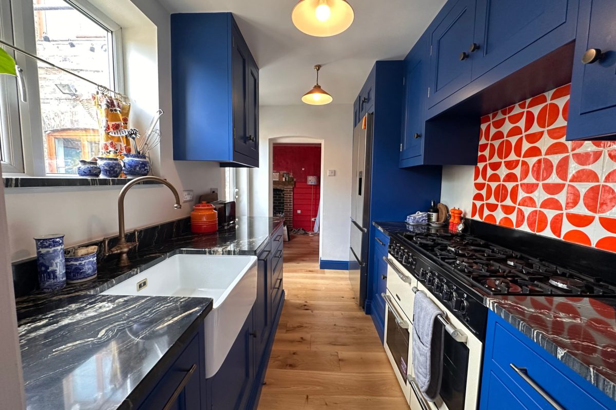 Long Melford handmade kitchen case study from Regent St James Kitchens showcasing bespoke design, hand-painted cabinetry and clever storage.